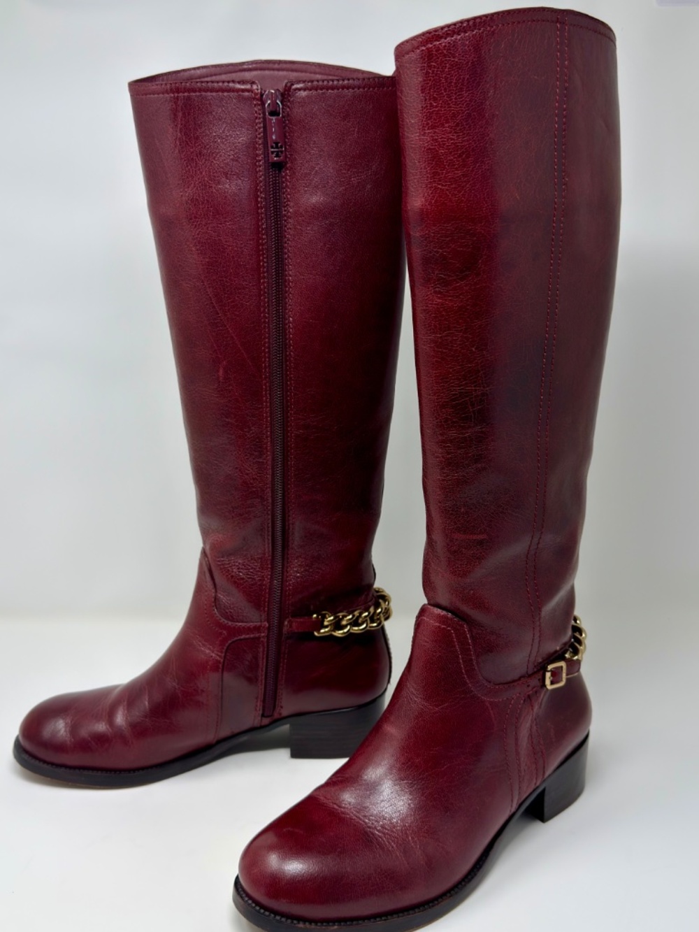 Tory Burch Tall Riding Boots with gold tone chain accent